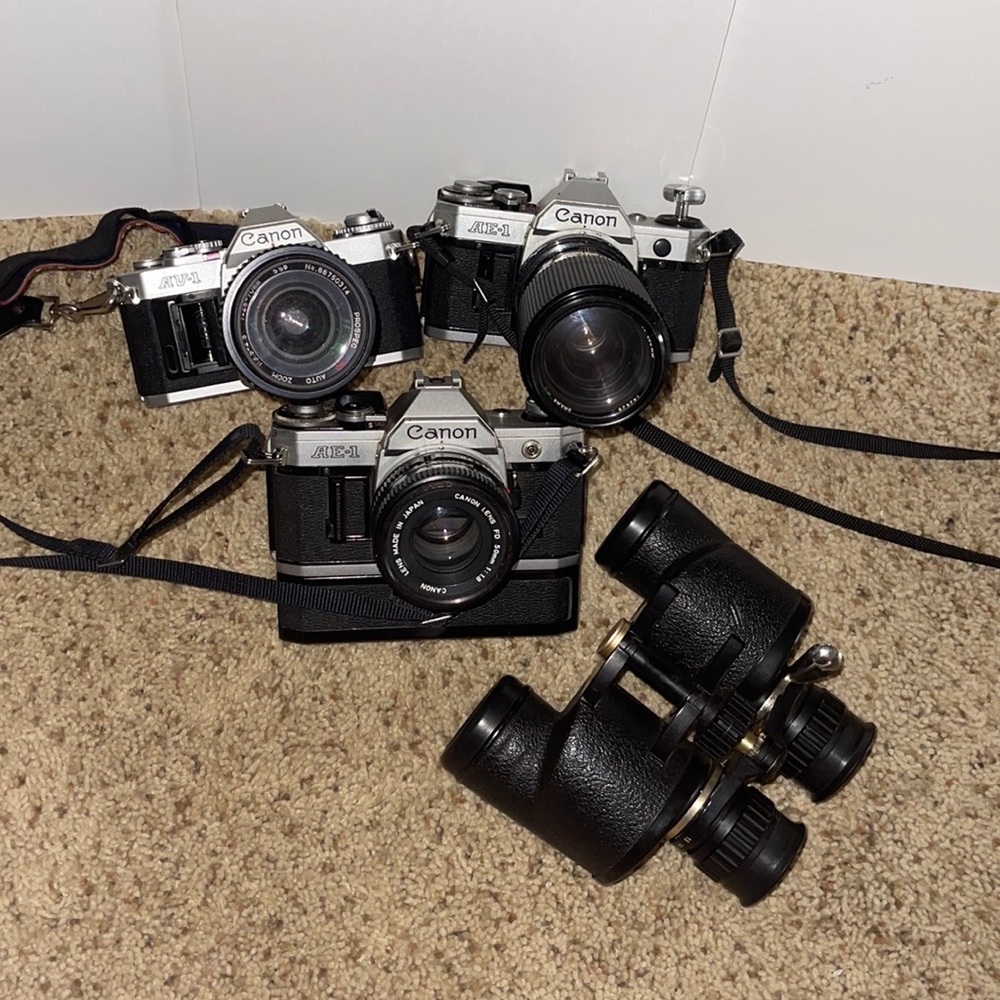 3 Vintage Canon Film Cameras and 1 Tasco Binocular